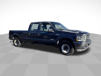2003 Ford Super Duty F-350 SRW — rear three-quarter view