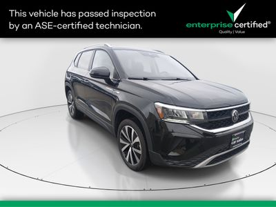 2024 Volkswagen Taos SE FWD — front three-quarter view