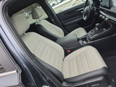 2024 Honda CR-V Hybrid Sport Touring RS6H9RKXW — front three-quarter view