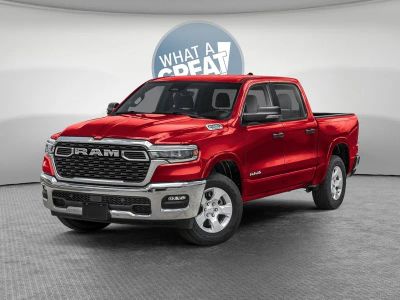 2026 RAM 1500 RAM 1500 BIG HORN CREW CAB 4X4 5'7' BOX in Molten Red Pearl-Coat Exterior Paint — front three-quarter view