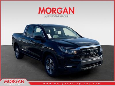2026 Honda Ridgeline RTL in Crystal Black Pearl — front three-quarter view