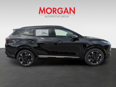 2026 Kia Sportage — rear three-quarter view