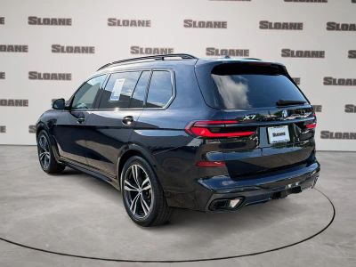 2025 BMW X7 — rear three-quarter view