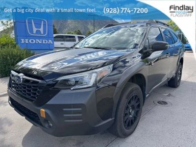 2022 Subaru Outback Wilderness in Crystal Black Silica — front three-quarter view