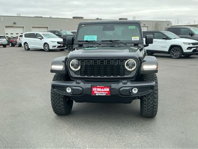 2026 Jeep Wrangler — rear three-quarter view