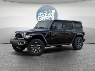 2025 Jeep Wrangler — rear three-quarter view