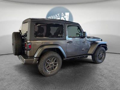 2026 Jeep Wrangler — rear three-quarter view