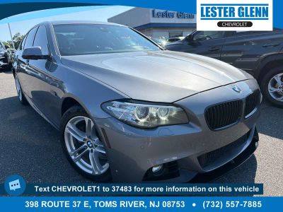 2015 BMW 528i xDrive in Silver — front three-quarter view