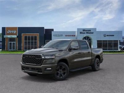 2026 RAM Ram 1500 RAM 1500 BIG HORN CREW CAB 4X4 5'7' BOX in Tank Exterior Paint — front three-quarter view
