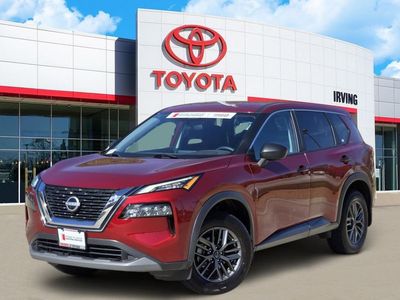 2023 Nissan Rogue S in Red — front three-quarter view