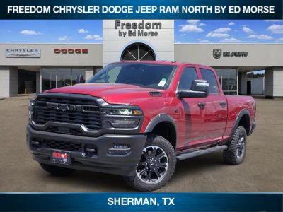2026 RAM Ram 2500 RAM 2500 WARLOCK CREW CAB 4X4 6'4' BOX in Molten Red Pearl-Coat Exterior Paint — front three-quarter view