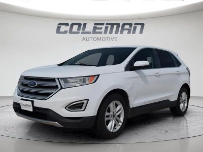 2017 Ford Edge SEL in Oxford White — front three-quarter view