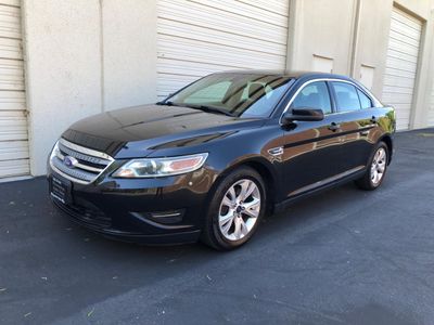 2012 Ford Taurus in Black — front three-quarter view