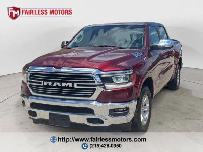 2019 RAM 1500 Laramie 4x4 4dr Crew Cab 5.6 ft. SB Pickup in Delmonico Red Pearl Coat — front three-quarter view
