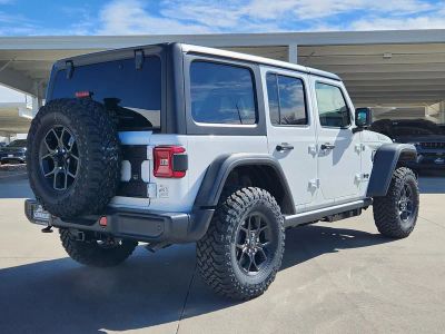 2026 Jeep Wrangler — rear three-quarter view