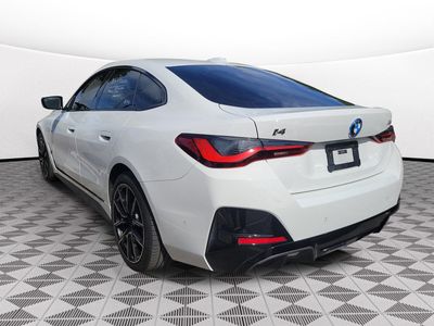 2024 BMW i4 — rear three-quarter view