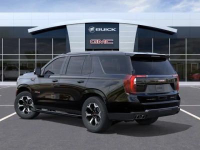 2026 GMC Yukon — rear three-quarter view