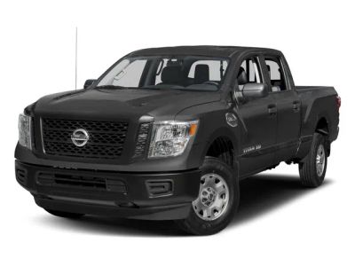 2016 Nissan Titan XD SL in Black — front three-quarter view
