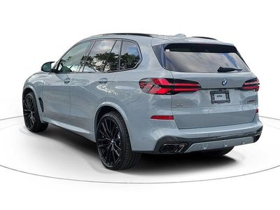 2026 BMW X5 — rear three-quarter view