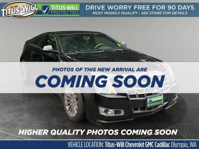 2014 Cadillac CTS Premium in Black Raven — front three-quarter view