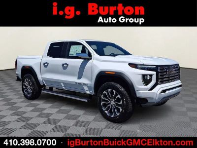 2026 GMC Canyon Denali in Summit White — front three-quarter view