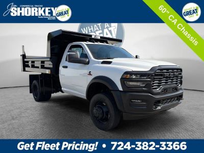 2026 RAM 5500 Tradesman DRW 4x4 / 6.7L Diesel / 9'7" Steel Dump in Bright White Clear-Coat Exterior Paint — front three-quarter view