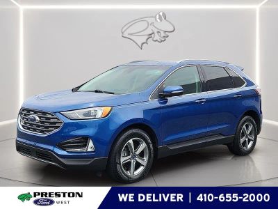 2020 Ford Edge SEL in Atlas Blue — front three-quarter view