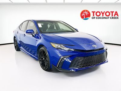 2025 Toyota Camry SE in Blue — front three-quarter view