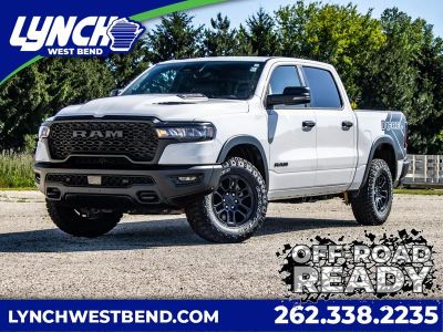 2026 RAM 1500 Rebel in White — front three-quarter view