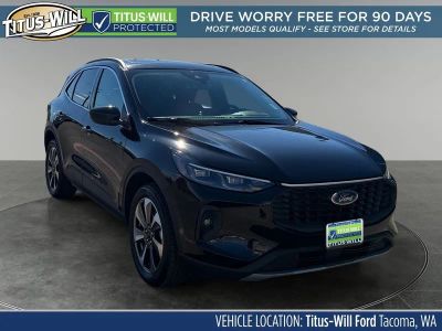 2025 Ford Escape Platinum in Black — front three-quarter view
