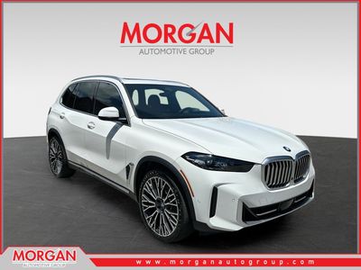 2024 BMW X5 sDrive40i in White — front three-quarter view
