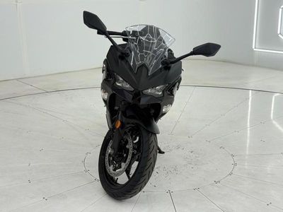 2026 Kawasaki Ninja 500 Metallic Flat Spark Black — rear three-quarter view