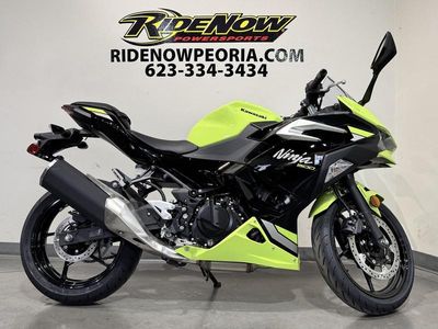 2026 Kawasaki Ninja 500 ABS Metallic Yellowish Green/Ebony in METALLIC YELLOWISH GREEN / EBONY — front three-quarter view