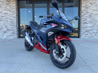 2026 Kawasaki Ninja 500 SE ABS in BLUE / RED — front three-quarter view