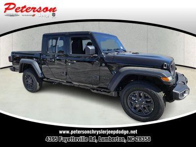 2026 Jeep Gladiator GLADIATOR SPORT 4X4 in Black Clear-Coat Exterior Paint — front three-quarter view
