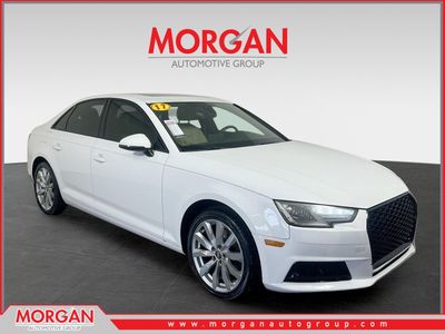 2017 Audi A4 2.0T ultra Premium in Ibis White — front three-quarter view