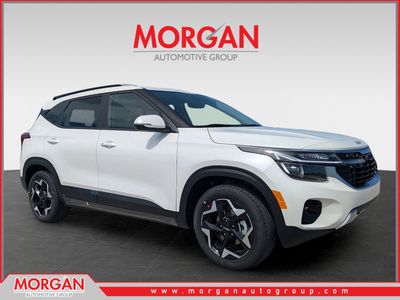 2026 Kia Seltos S in Snow White Pearl — front three-quarter view