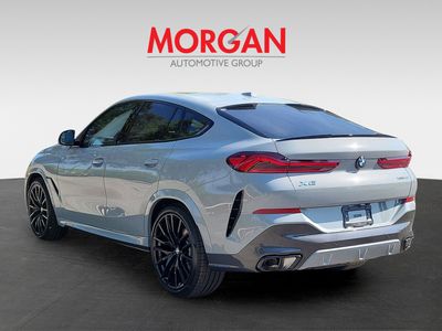 2026 BMW X6 — rear three-quarter view