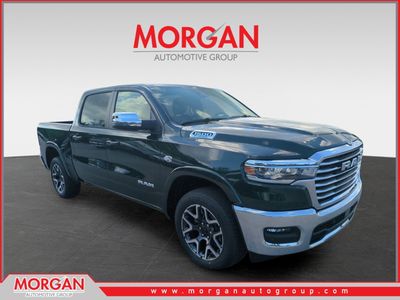 2026 Ram 1500 Laramie in Green — front three-quarter view