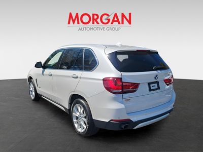 2014 BMW X5 — rear three-quarter view