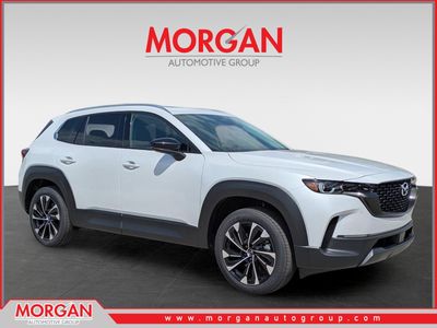 2026 Mazda CX-50 Hybrid Premium Plus in Wind Chill Pearl — front three-quarter view