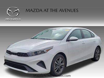 2024 Kia Forte LXS in White — front three-quarter view