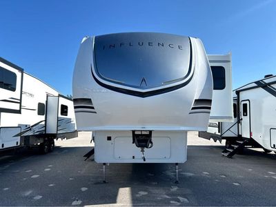 2026 Grand Influence — rear three-quarter view