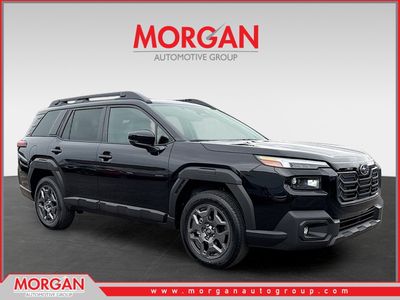 2026 Subaru Outback Premium in Crystal Black Silica — front three-quarter view