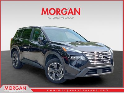2024 Nissan Rogue SV in Black — front three-quarter view