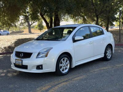 2012 Nissan Sentra in White — front three-quarter view