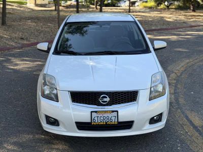 2012 Nissan Sentra — rear three-quarter view