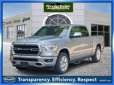 2023 RAM 1500 Big Horn Crew Cab 4x4 5'7' Box in Billet Silver Metallic Clearcoat — front three-quarter view