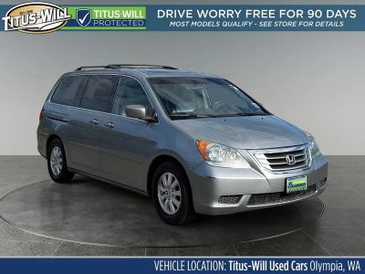 2010 Honda Odyssey EX-L in Silver — front three-quarter view