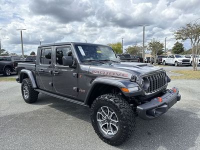 2025 Jeep Gladiator Mojave in Gray — front three-quarter view
